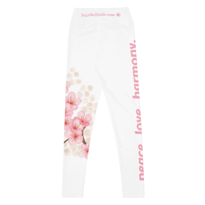 White leggings featuring a pink cherry blossom floral print on one leg and vertical pink text reading 'peace love harmony' on the other leg, with 'PeLoHaStudio.com' printed at the back waistband.