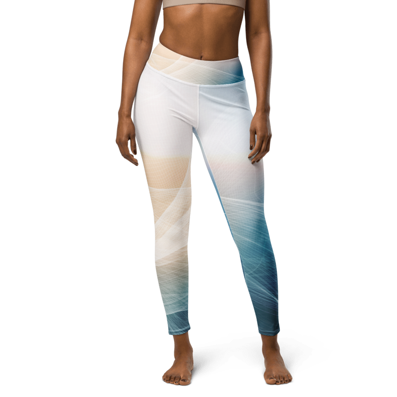 A model wearing high-waisted athletic leggings with a white, beige, and blue abstract wave pattern, shown against a plain white background.