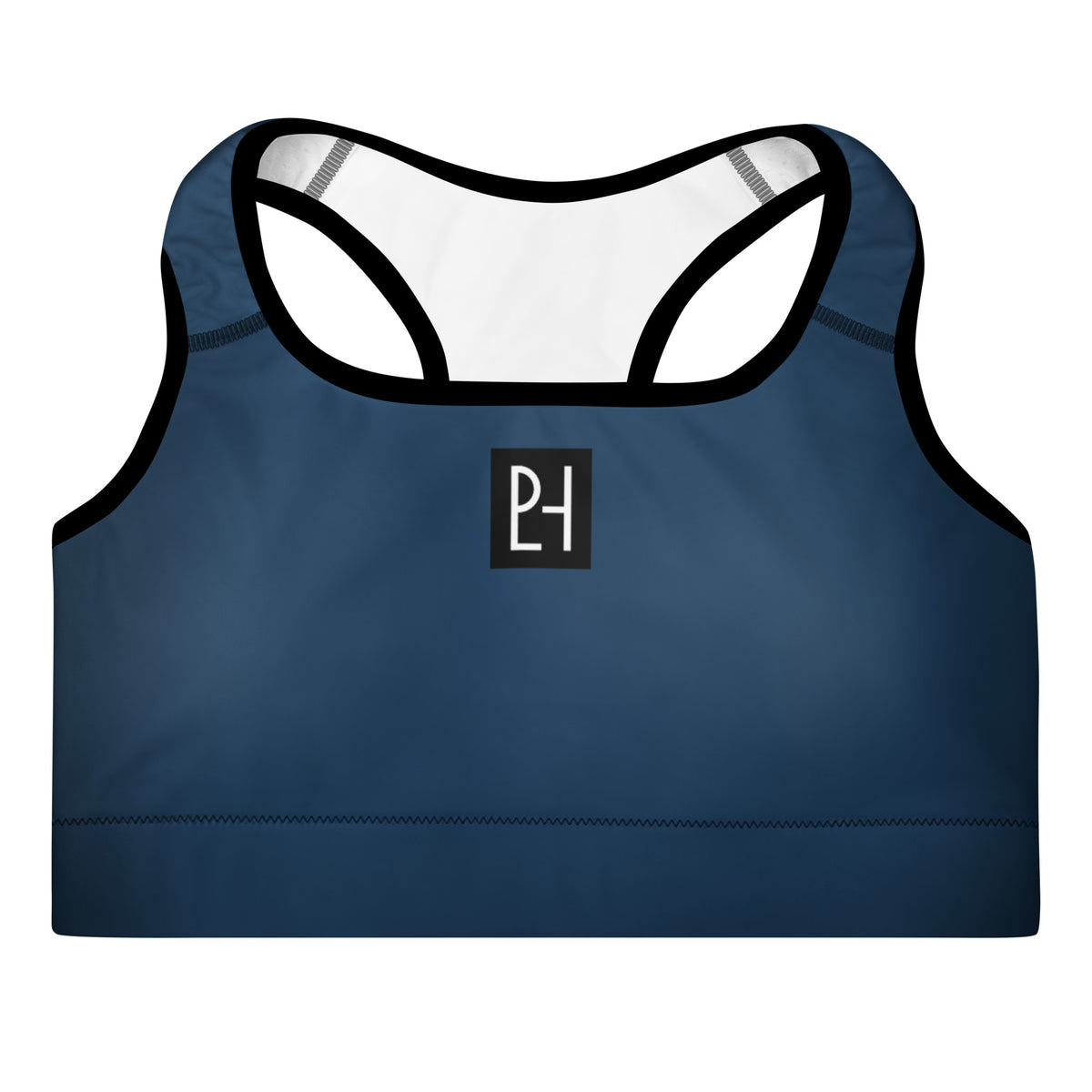 The solid color accent sports bra from the Indigo Illusion collection, styled to highlight its clean lines and minimalist activewear design.