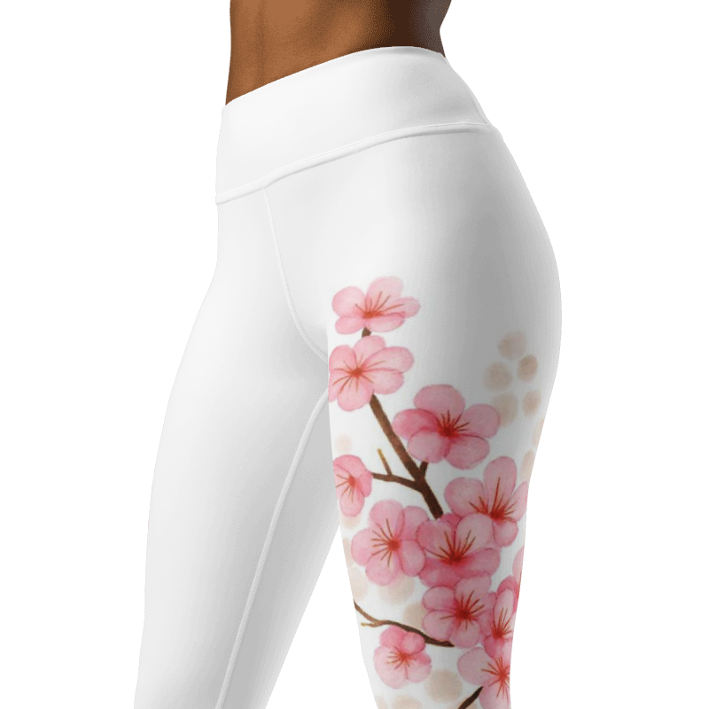 Close-up of the raised waistband and smooth microfiber fabric on pink floral sakura yoga leggings.