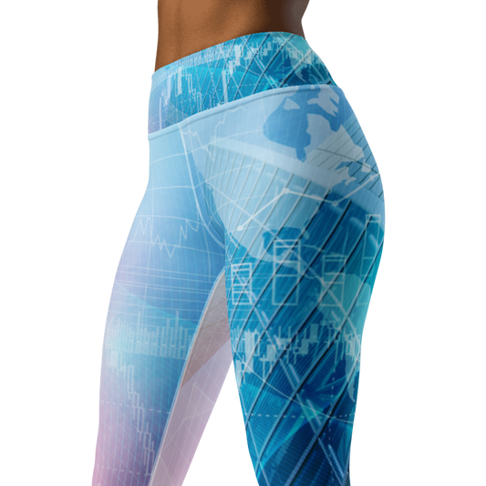 A close-up side view of a person wearing high-waisted leggings with a blue and light blue tech-style print featuring world map graphics, grid lines, and data charts on a white background.