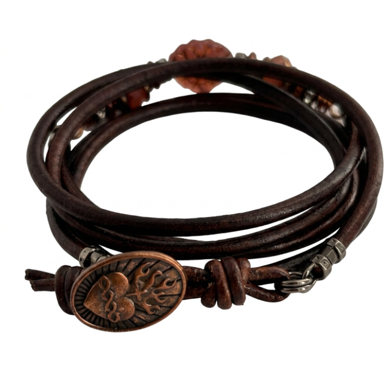 A multi-strand dark brown leather wrap bracelet with a bronze-toned oval heart charm, small metallic spacer beads, and reddish-brown stone accents, shown on a plain white background.