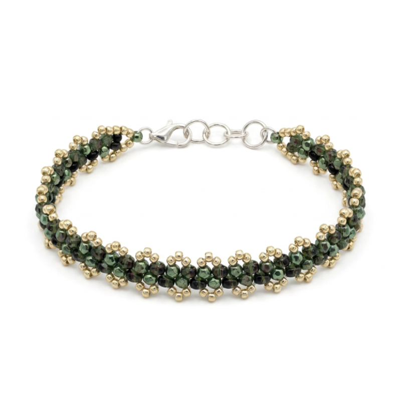 A beaded bracelet with green glass seed beads and silver seed beads, featuring a silver-plated lobster clasp, shown on a plain white background.