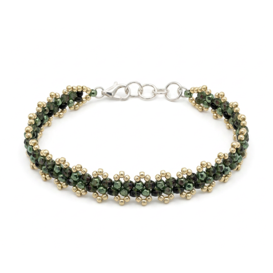 A beaded bracelet with green glass seed beads and silver seed beads, featuring a silver-plated lobster clasp, shown on a plain white background.